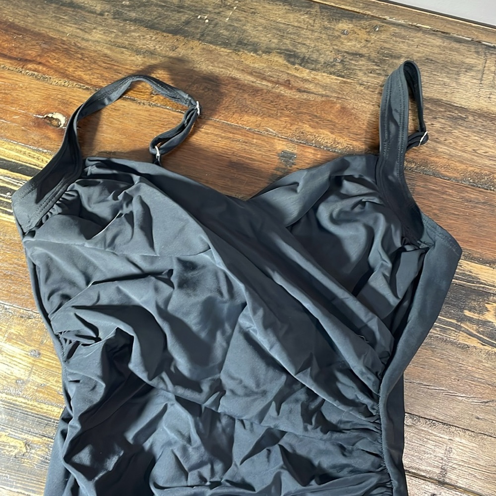 Miracle Suit by Kirkland black one piece ruching aprox size 14/16 tag removed